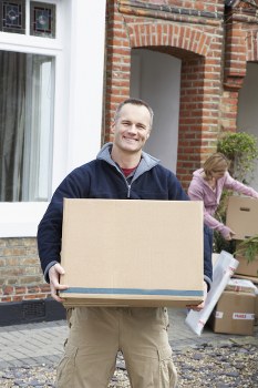 Removal team assisting with a house move in Haringey street setting