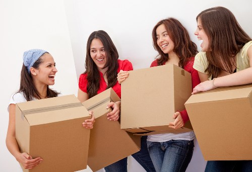 Packed moving boxes and furniture prepared for a local Haringey house move