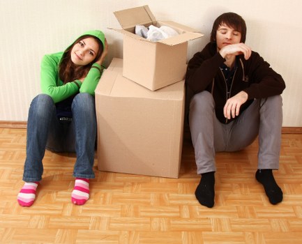 Packed furniture and boxes ready for removal truck loading