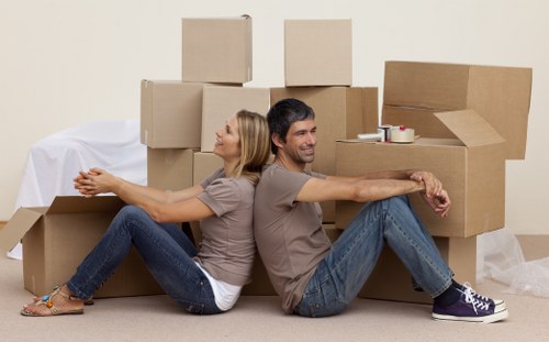 Packed office boxes and equipment ready for relocation in North London