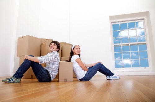 Furniture and packed boxes ready for transport in a removals van
