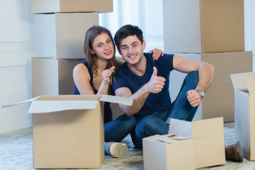 Loading boxes and furniture into a removals van