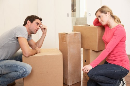 Packing and loading furniture into a moving van in North London