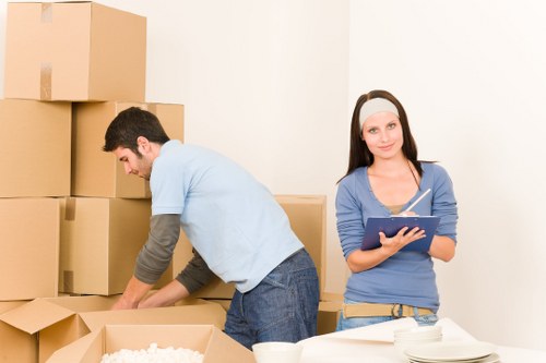 Driver and helper preparing a van for a safe move